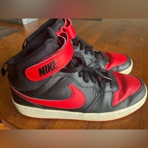 Nike Black and Red High-Top Sneakers with Classic Design